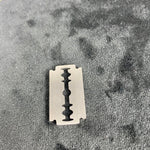 Pendentif Lame de rasoir argenté